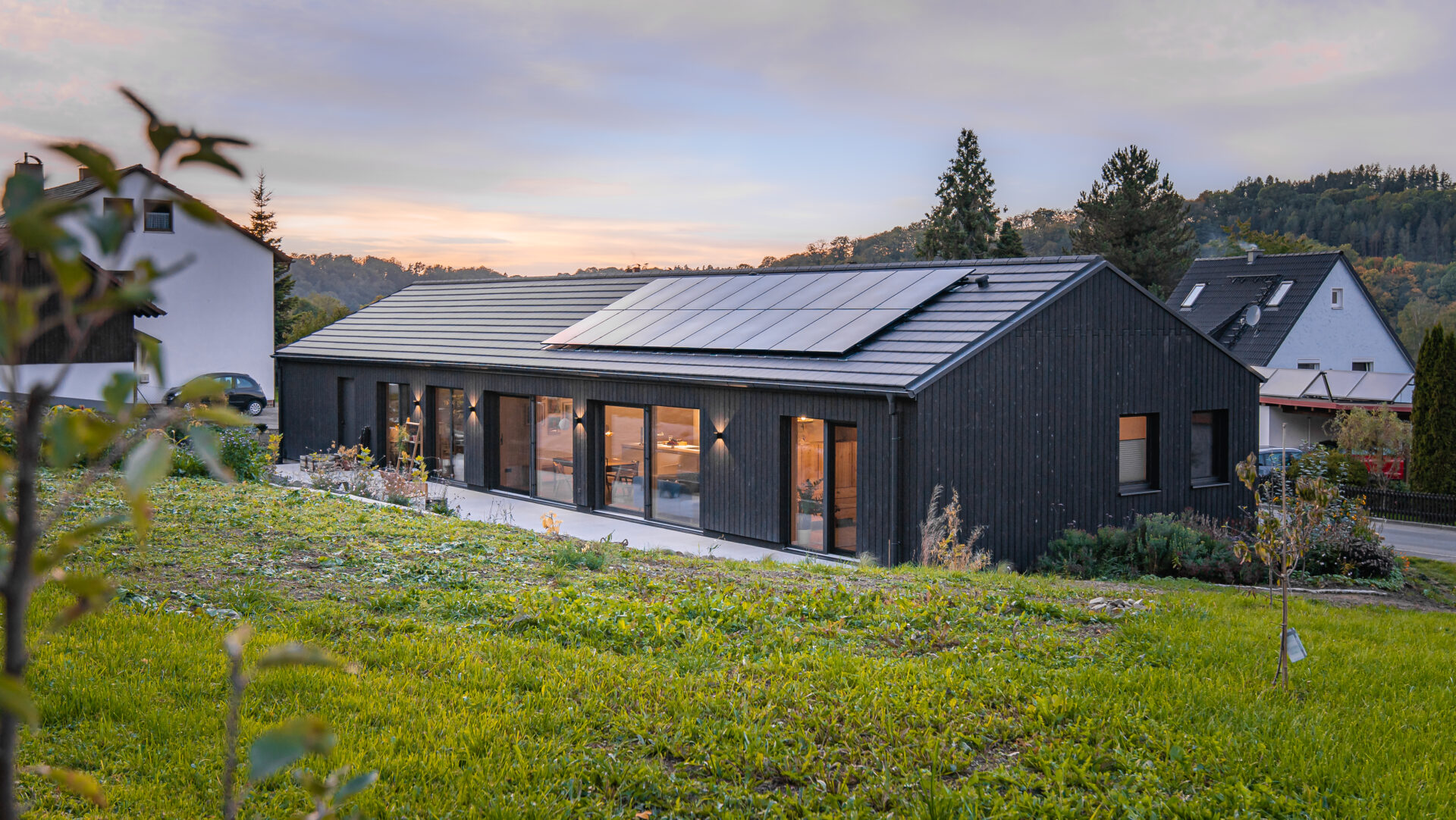 House in Bad Berneck, Fichtel Mountains, Germany. Suyaki shou sugi ban siding in Ebony.