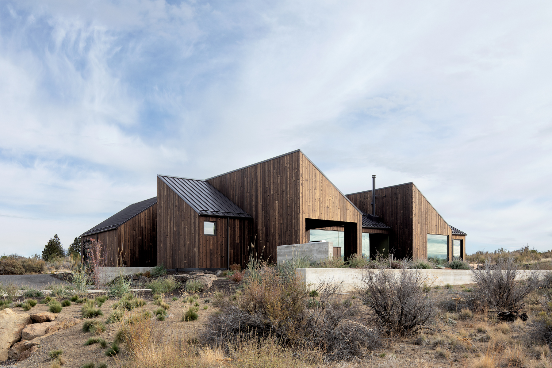 Yakisugi "Shou sugi ban" charred wood siding in a Gendai® Linseed Oil Amber finish installed on the Octothorpe House in the high desert city of Bend, Oregon.